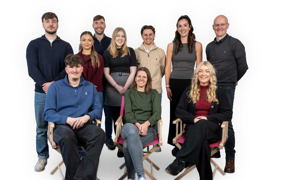 team picture of the staff at Front Page Advantage